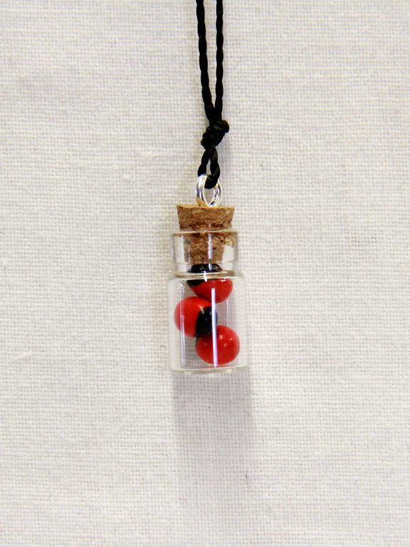 Collana con semi di Huayruro Inca.